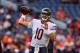 DENVER, CO - AUGUST 18: Quarterback Mitchell Trubisky #10 of the Chicago Bears throws as he warms up before a preseason game against the Denver Broncos during an NFL preseason game at Broncos Stadium at Mile High on August 18, 2018 in Denver, Colorado. (Photo by Dustin Bradford/Getty Images)