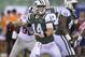New York Jets quarterback Sam Darnold (14) steps back to throw against the New York Giants during the second quarter of an NFL football game, Friday, Aug. 24, 2018, in East Rutherford, N.J. (AP Photo/Bill Kostroun)