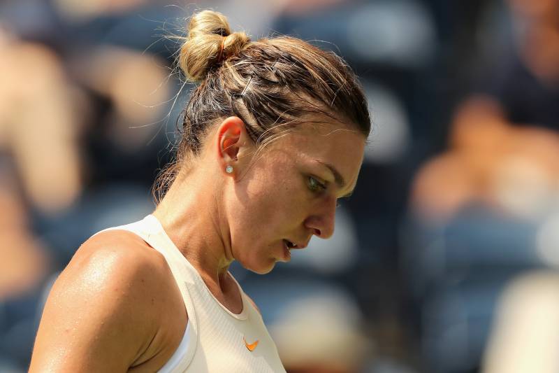 World No. 1 Simona Halep fell in the first round at the 2018 U.S. Open on Monday as she was defeated 6-2, 6-4 by Estonia's Kaia Kanepi.  The French Open champion looked to have turned the momentum in her favour when she levelled from a double break down to 4-4 in the second set. But she was then broken again before world No. 44 Kanepi secured a momentous triumph.  In the men's draw, eighth seed Grigor Dimitrov was the biggest casualty in Monday's opening session as he lost 6-3, 6-2, 7-5 to three-time Grand Slam champion Stan Wawrinka.  Elsewhere, Andy Murray came through in four sets against James Duckworth, but his fellow Brit, Kyle Edmund, was downed by Italy's Paolo Lorenzi.