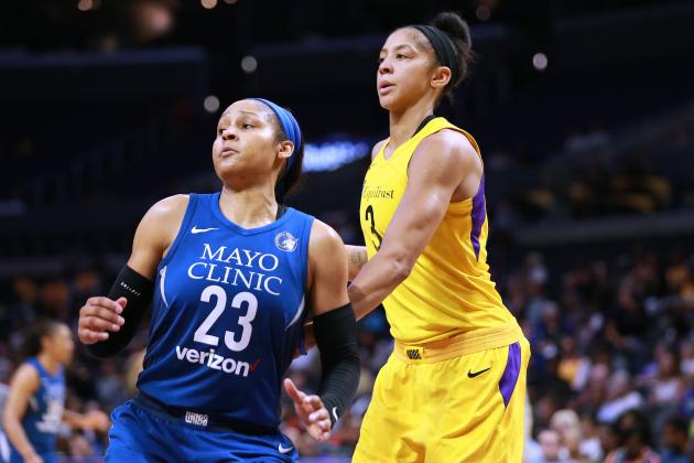 LOS ANGELES, CA - AUGUST 21: Maya Moore #23 of the Minnesota Lynx battles for position against Candace Parker #3 of the Los Angeles Sparks in Round One of the 2018 WNBA Playoffs at Staples Center on August 21, 2018 in Los Angeles, California.  (Photo by Leon Bennett/Getty Images)