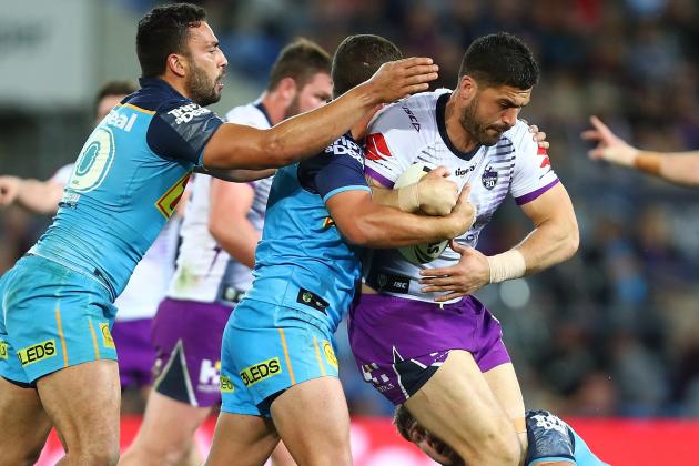 GOLD COAST, AUSTRALIA - AUGUST 25: Jesse Bromwich of the Storm is tackled during the round 24 NRL match between the Gold Coast Titans and the Melbourne Storm at Cbus Super Stadium on August 25, 2018 in Gold Coast, Australia. (Photo by Chris Hyde/Getty Images)
