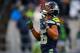 SEATTLE, WA - DECEMBER 31: Wide receiver Tyler Lockett #16 of the Seattle Seahawks reacts during the game against the Arizona Cardinals at CenturyLink Field on December 31, 2017 in Seattle, Washington. (Photo by Jonathan Ferrey/Getty Images)