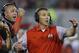 FILE - In this Sept. 17, 2016, file photo, Ohio State head coach Urban Meyer, right, and then-assistant coach Zach Smith, left, gesture from the sidelines during an NCAA college football game against Oklahoma in Norman, Okla. What has transpired over the last three weeks at Ohio State should be a lesson to all coaches. Your football program is not a family. Urban Meyer treated Zach Smith like family, and it almost cost one of the most accomplished coaches in college football his job. (AP Photo/Sue Ogrocki, File)