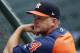 Houston Astros manager AJ Hinch watches batting practice before the team's baseball game against the Colorado Rockies on Wednesday, July 25, 2018, in Denver. (AP Photo/David Zalubowski)