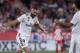 Real Madrid's Karim Benzema celebrates scoring his side's 4th goal during the Spanish La Liga soccer match between Girona and Real Madrid at the Montilivi stadium in Girona, Sunday, Aug. 26, 2018. (AP Photo/Eric Alonso)