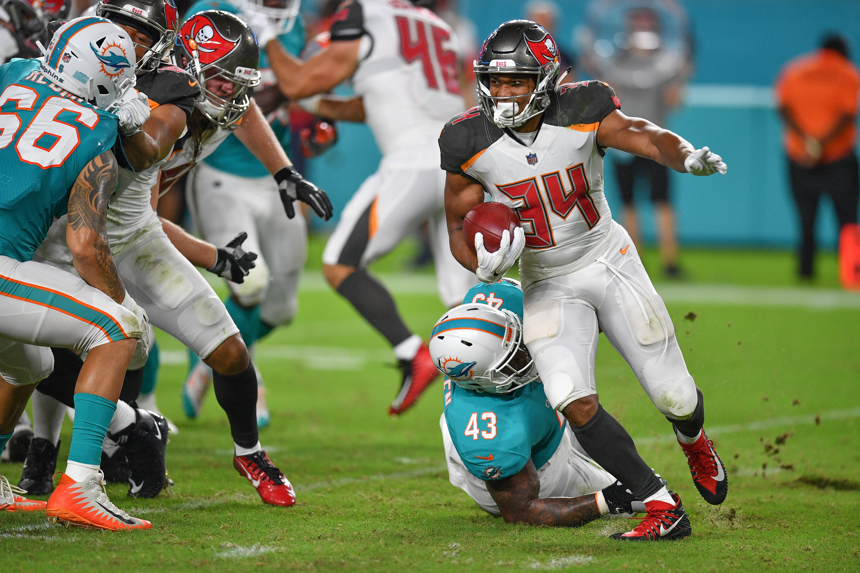 Charles Sims of the Tampa Bay Buccaneers is tackled after a run