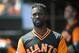 SAN FRANCISCO, CA - AUGUST 25: Andrew McCutchen #22 of the San Francisco Giants looks on from the dugout after he scored against the Texas Rangers in the bottom of the first inning at AT&T Park on August 25, 2018 in San Francisco, California. (Photo by Thearon W. Henderson/Getty Images)