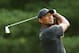 NORTON, MA - AUGUST 31: Tiger Woods of the United States plays his shot from the 11th tee during the first round of the Dell Technologies Championship at TPC Boston on August 31, 2018 in Norton, Massachusetts. (Photo by Patrick Smith/Getty Images)