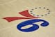 PHILADELPHIA, PA - NOVEMBER 18: A general view of the Philadelphia 76ers logo at center court against the Golden State Warriors at the Wells Fargo Center on November 18, 2017 in Philadelphia, Pennsylvania. NOTE TO USER: User expressly acknowledges and agrees that, by downloading and or using this photograph, User is consenting to the terms and conditions of the Getty Images License Agreement. (Photo by Mitchell Leff/Getty Images)