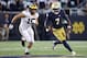 SOUTH BEND, IN - SEPTEMBER 01: Brandon Wimbush #7 of the Notre Dame Fighting Irish carries the ball against Chase Winovich #15 of the Michigan Wolverines in the first quarter at Notre Dame Stadium on September 1, 2018 in South Bend, Indiana. (Photo by Gregory Shamus/Getty Images)