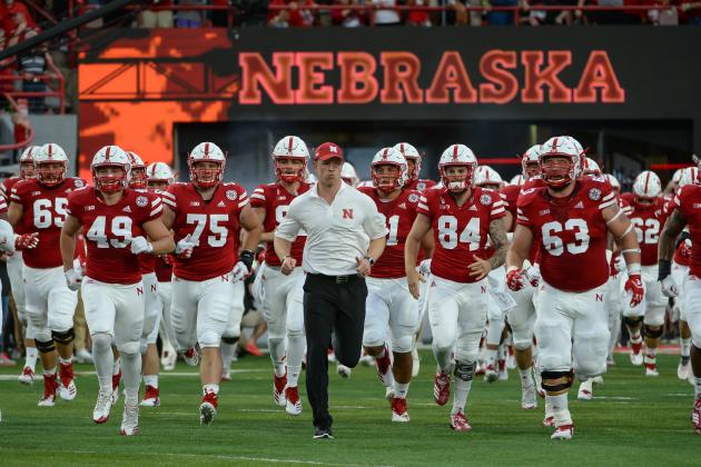 LINCOLN, NE - SEPTEMBER 01: Head coach Scott Frost of the Nebraska Cornhuskers leads the team on the field before the game against the Akron Zips at Memorial Stadium on September 1, 2018 in Lincoln, Nebraska. (Photo by Steven Branscombe/Getty Images)