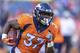 DENVER, CO - AUGUST 11: Royce Freeman #37 of the Denver Broncos warming up before a game against the Minnesota Vikings during week one of preseason at Broncos Stadium at Mile High on August 11, 2018 in Denver, Colorado. The Vikings defeated the Broncos 42-28. (Photo by Wesley Hitt/Getty Images)