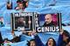 Manchester City fans hold up placards showing the faces of Manchester City's Spanish manager Pep Guardiola (R) and Manchester United's Portuguese manager Jose Mourinho (L) during the English Premier League football match between Manchester City and Manchester United at the Etihad Stadium in Manchester, north west England, on April 7, 2018. / AFP PHOTO / Ben STANSALL / RESTRICTED TO EDITORIAL USE. No use with unauthorized audio, video, data, fixture lists, club/league logos or 'live' services. Online in-match use limited to 75 images, no video emulation. No use in betting, games or single club/league/player publications. / (Photo credit should read BEN STANSALL/AFP/Getty Images)