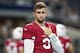 ARLINGTON, TX - AUGUST 26: Josh Rosen #3 of the Arizona Cardinals warms up before a game against the Dallas Cowboys at AT&T Stadium during week 3 of the preseason on August 26, 2018 in Arlington, Texas. The Cardinals defeated the Cowboys 27-3. (Photo by Wesley Hitt/Getty Images)