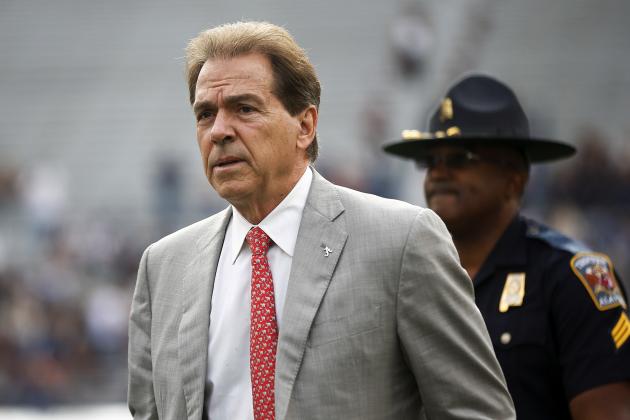FILE - In this Nov. 25, 2017, file photo, Alabama head coach Nick Saban walks the field before the Iron Bowl NCAA college football game against Auburn, in Auburn, Ala. The Associated Press voters prefer Alabama over Ohio State. In the final Top 25 of the regular season, the Crimson Tide was No. 4 and the Buckeyes were No. 5. (AP Photo/Brynn Anderson, File)