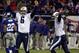 EAST RUTHERFORD, UNITED STATES: Tennessee Titans' placekicker Joe Nedney (L) celebrates with Craig Hentrich (R) after kicking the game-winning field goal in overtime for a 32-29 victory over the New York Giants 01 December, 2002 at Giants Stadium in East Rutherford, New Jersey. AFP PHOTO/Matt CAMPBELL (Photo credit should read MATT CAMPBELL/AFP/Getty Images)