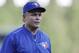 Toronto Blue Jays manager John Gibbons walks back to the dugout after visiting the mound during the third inning of a baseball game against the Detroit Tigers, Saturday, July 15, 2017, in Detroit. (AP Photo/Carlos Osorio)