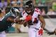 PHILADELPHIA, PA - SEPTEMBER 06: Devonta Freeman #24 of the Atlanta Falcons is tackled by Brandon Graham #55 of the Philadelphia Eagles during the first half at Lincoln Financial Field on September 6, 2018 in Philadelphia, Pennsylvania. (Photo by Brett Carlsen/Getty Images)
