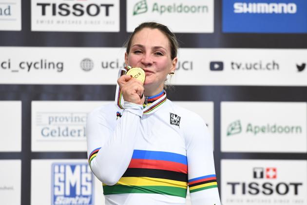 Gold medalist Germany's Kristina Vogel celebrates on the podium after taking part in the women's sprint final during the UCI Track Cycling World Championships in Apeldoorn on March 2, 2018. / AFP PHOTO / EMMANUEL DUNAND (Photo credit should read EMMANUEL DUNAND/AFP/Getty Images)