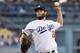 Los Angeles Dodgers pitcher Clayton Kershaw throws to the plate during the first inning of a baseball game against the Arizona Diamondbacks, Saturday, Sept. 1, 2018, in Los Angeles. (AP Photo/Michael Owen Baker)