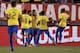 Brazil forward Roberto Firmino, center, is congratulated by teammates after scoring a goal against the United States during the first half of an international soccer friendly match, Friday, Sept. 7, 2018, in East Rutherford, N.J. (AP Photo/Julio Cortez)