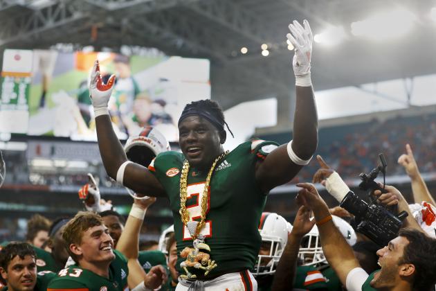 Miami defensive back Trajan Bandy (2) celebrates a turnover against Savannah State during the first half of an NCAA college football game, Saturday, Sept. 8, 2018, in Miami Gardens, Fla. (AP Photo/Brynn Anderson)