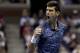 Novak Djokovic, of Serbia, reacts during a match against Juan Martin del Potro, of Argentina, in the men's final of the U.S. Open tennis tournament, Sunday, Sept. 9, 2018, in New York. (AP Photo/Julio Cortez)
