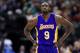Los Angeles Lakers forward Luol Deng (9) walks toward the bench during the second half of an NBA basketball game against the Dallas Mavericks, Sunday, Jan. 22, 2017, in Dallas. (AP Photo/Ron Jenkins)