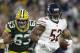 Chicago Bears' Khalil Mack intercepts a pass and returns it for a touchdown during the first half of an NFL football game against the Green Bay Packers Sunday, Sept. 9, 2018, in Green Bay, Wis. (AP Photo/Jeffrey Phelps)