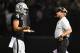 OAKLAND, CA - SEPTEMBER 10: Derek Carr #4 of the Oakland Raiders speaks with head coach Jon Gruden during their NFL game against the Los Angeles Rams at Oakland-Alameda County Coliseum on September 10, 2018 in Oakland, California. (Photo by Thearon W. Henderson/Getty Images)