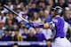DENVER, CO - SEPTEMBER 10: Trevor Story #27 of the Colorado Rockies follows the flight of a three run homerun against the Arizona Diamondbacks in the fifth inning of a game at Coors Field on September 10, 2018 in Denver, Colorado. (Photo by Dustin Bradford/Getty Images)
