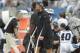 Carolina Panthers' Greg Olsen watches the action from the sidelines during the second half of an NFL football game against the Dallas Cowboys in Charlotte, N.C., Sunday, Sept. 9, 2018. (AP Photo/Mike McCarn)