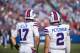 ORCHARD PARK, NY - AUGUST 26: Josh Allen #17 and Nathan Peterman #2 of the Buffalo Bills speak with coaching staff during the preseason game against the Cincinnati Bengals at New Era Field on August 26, 2018 in Orchard Park, New York. Cincinnati defeats Buffalo 26-13 in the preseason matchup. (Photo by Brett Carlsen/Getty Images)