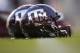 The Texas A & M reflective helmets are sitting on the field before the start of the NCAA College Football against the Mississippi State on Saturday, October 28, 2017 in College Station, Texas. (AP Photo / Sam Craft)