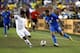Brazil forward Neymar, right, dribbles the ball around El Salvador midfielder Gilberto Baires in the first half of a soccer match, Tuesday, Sept. 11, 2018, in Landover, Md. (AP Photo/Patrick Semansky)