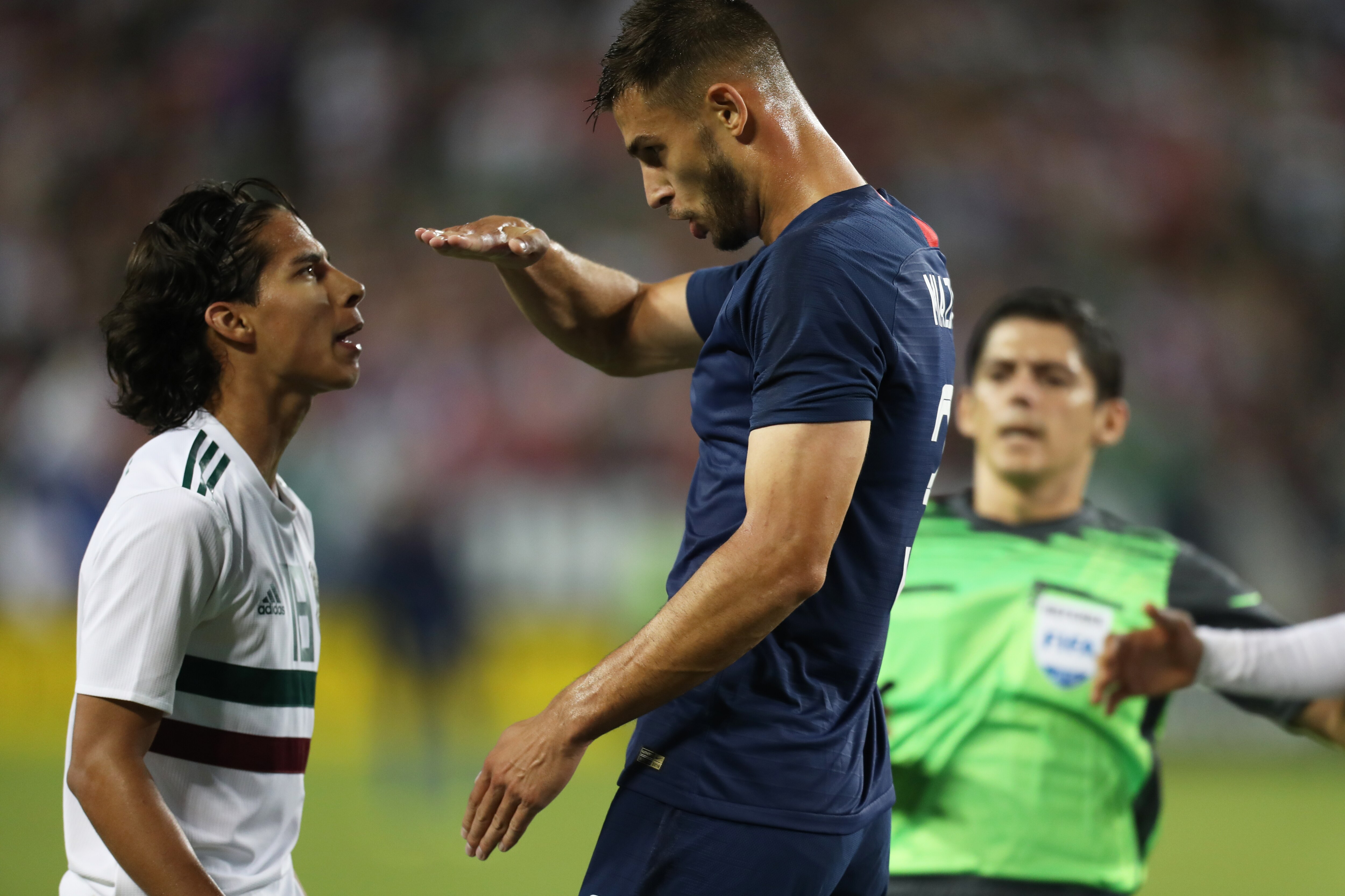 NASHVILLE, TN - SEPTEMBER 11: Diego Lainez of Mexico and Matt Miazga of the United States argue during an international friendly match between Mexico and United States at Nissan Stadium on September 11, 2018 in Nashville, Tennessee. (Photo by Omar Vega/Getty Images)