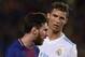 TOPSHOT - Real Madrid's Portuguese forward Cristiano Ronaldo (R) looks at Barcelona's Argentinian forward Lionel Messi during the Spanish league football match between FC Barcelona and Real Madrid CF at the Camp Nou stadium in Barcelona on May 6, 2018. (Photo by Josep LAGO / AFP) (Photo credit should read JOSEP LAGO/AFP/Getty Images)