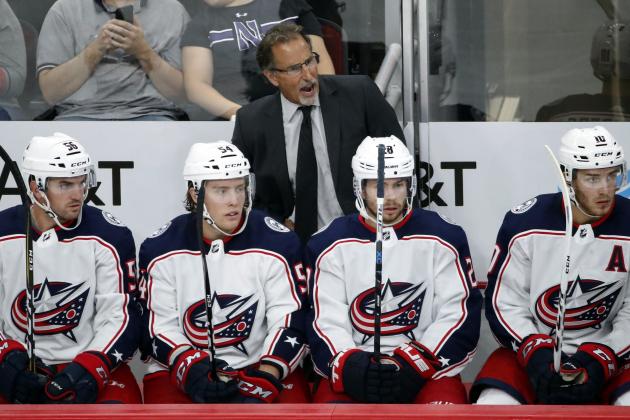 FILE - In this Sept. 23, 2017, file photo, Columbus Blue Jackets head coach John Tortorella, top center, yells to his team during the third period of a preseason NHL hockey game against the Chicago Blackhawks in Chicago. The Jackets host the New York Islanders in the season opener Friday night (AP Photo/Kamil Krzaczynski, File)