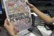 Melbourne-based newspaper Herald Sun displays a controversial cartoon of Serena Williams that has been widely condemned as a racist depiction of the tennis great, in Melbourne, Australia, Wednesday, Sept. 12, 2018. The newspaper defended its cartoonist Mark Knight's depiction of Williams and is asserting the condemnation, which has come from all parts of the world, is driven by political correctness. (AP Photo)