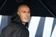 Former French football player and former Real Madrid coach Zinedine Zidane looks on as he shelters under an umbrella in Saint Denis, suburban Paris on June 11, 2018 during an event marking the 20th anniversary of France's 1998 World Cup victory. (Photo by Eric FEFERBERG / AFP) (Photo credit should read ERIC FEFERBERG/AFP/Getty Images)