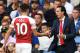 LONDON, ENGLAND - AUGUST 18: Mesut Ozil of Arsenal shakes hands with Unai Emery, Manager of Arsenal as he leaves the pitch from substitution during the Premier League match between Chelsea FC and Arsenal FC at Stamford Bridge on August 18, 2018 in London, United Kingdom. (Photo by Mike Hewitt/Getty Images)