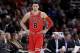 Chicago Bulls guard Zach LaVine (8) looks around during the second half of an NBA basketball game against the Detroit Pistons, Saturday, Jan. 13, 2018, in Chicago. The Bulls won 107-105. (AP Photo/Nam Y. Huh)
