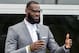 FILE - In this Monday, July 30, 2018, file photo, LeBron James speaks at the opening ceremony for the I Promise School in Akron, Ohio. James says he