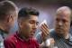 LONDON, ENGLAND - SEPTEMBER 15: Roberto Firmino is helped off the pitch by Liverpool FC medical staff after receiving a finger in the eye from Jan Vertonghen of Tottenham Hotspur during the Premier League match between Tottenham Hotspur and Liverpool FC at Wembley Stadium on September 15, 2018 in London, United Kingdom. (Photo by Visionhaus/Getty Images)