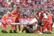 Bayern Munich's French midfielder Corentin Tolisso lies injured on the pitch during the German First division Bundesliga football match between FC Bayern Munich and Bayer Leverkusen in Munich, on September 15, 2018. (Photo by Guenter SCHIFFMANN / AFP) / DFL REGULATIONS PROHIBIT ANY USE OF PHOTOGRAPHS AS IMAGE SEQUENCES AND/OR QUASI-VIDEO (Photo credit should read GUENTER SCHIFFMANN/AFP/Getty Images)