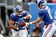 EAST RUTHERFORD, NJ - SEPTEMBER 09: (NEW YORK DAILIES OUT) Saquon Barkley #26 and Eli Manning #10 of the New York Giants in action against the Jacksonville Jaguars on September 9, 2018 at MetLife Stadium in East Rutherford, New Jersey. The Jaguars defeated the Giants 20-15. (Photo by Jim McIsaac/Getty Images)