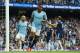 Manchester City's English midfielder Raheem Sterling celebrates after scoring their third goal during the English Premier League football match between Manchester City and Fulham at the Etihad Stadium in Manchester, north west England, on September 15, 2018. (Photo by Paul ELLIS / AFP) / RESTRICTED TO EDITORIAL USE. No use with unauthorized audio, video, data, fixture lists, club/league logos or 'live' services. Online in-match use limited to 120 images. An additional 40 images may be used in extra time. No video emulation. Social media in-match use limited to 120 images. An additional 40 images may be used in extra time. No use in betting publications, games or single club/league/player publications. / (Photo credit should read PAUL ELLIS/AFP/Getty Images)
