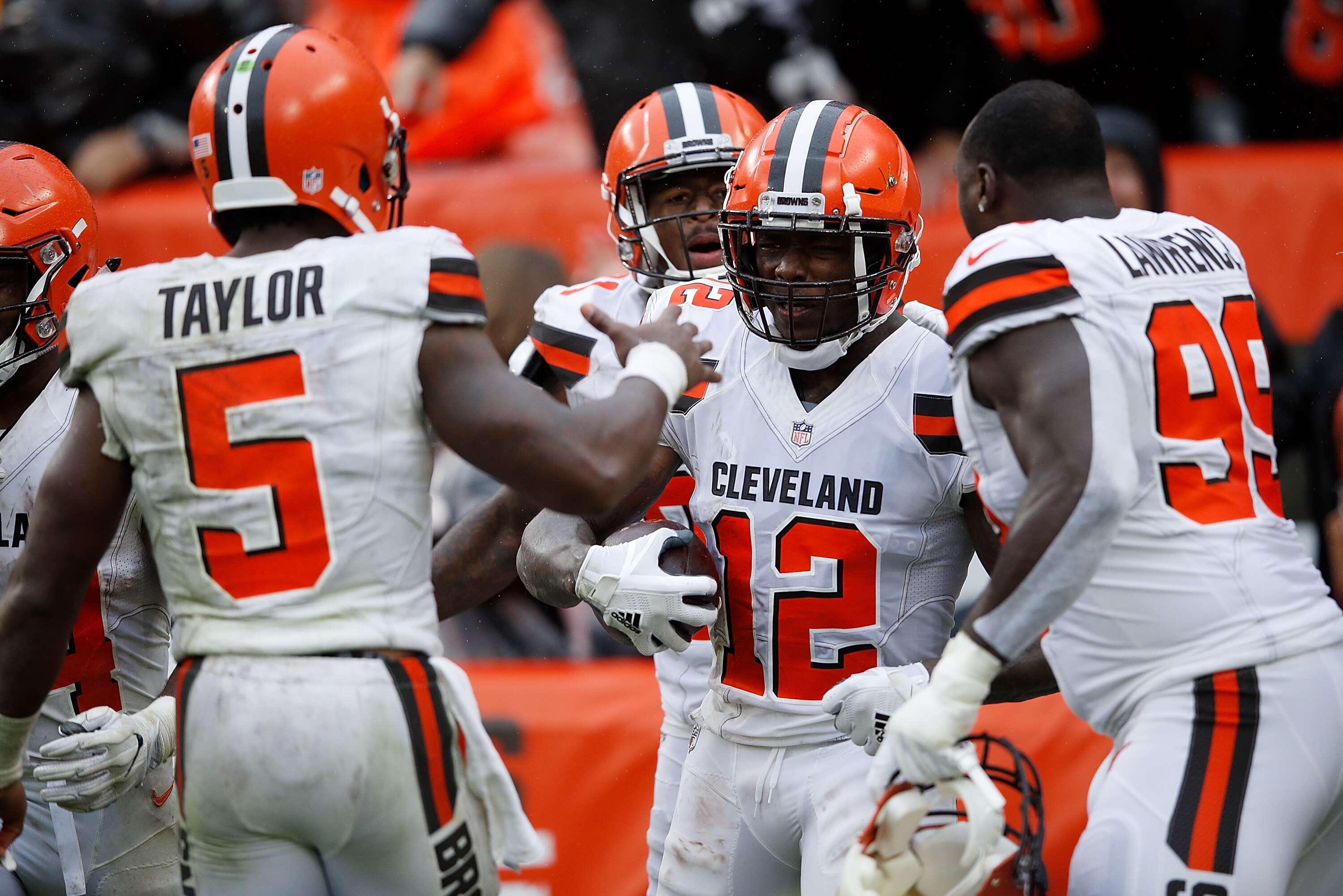 CLEVELAND, OH - SEPTEMBER 09:  Josh Gordon #12 celebrates his touchdown with Tyrod Taylor #5 and Devaroe Lawrence #99 of the Cleveland Browns during the fourth quarter against the Pittsburgh Steelers at FirstEnergy Stadium on September 9, 2018 in Cleveland, Ohio. (Photo by Joe Robbins/Getty Images)