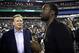 Rapper Meek Mill, right, and NFL Commissioner Roger Goodell talk before an NFL football game between the Philadelphia Eagles and the Atlanta Falcons, Thursday, Sept. 6, 2018, in Philadelphia. (AP Photo/Michael Perez)