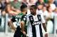 TURIN, ITALY - SEPTEMBER 16: Douglas Costa of Juventus (R) spits to Federico Di Francesco of Sassuolo during the serie A match between Juventus and US Sassuolo at Allianz Stadium on September 16, 2018 in Turin, Italy. (Photo by Claudio Villa./Getty Images)